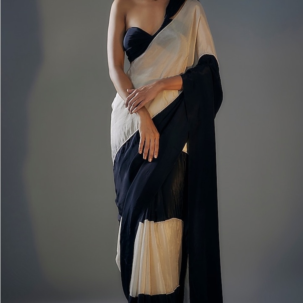 Elegant Black and Cream Saree